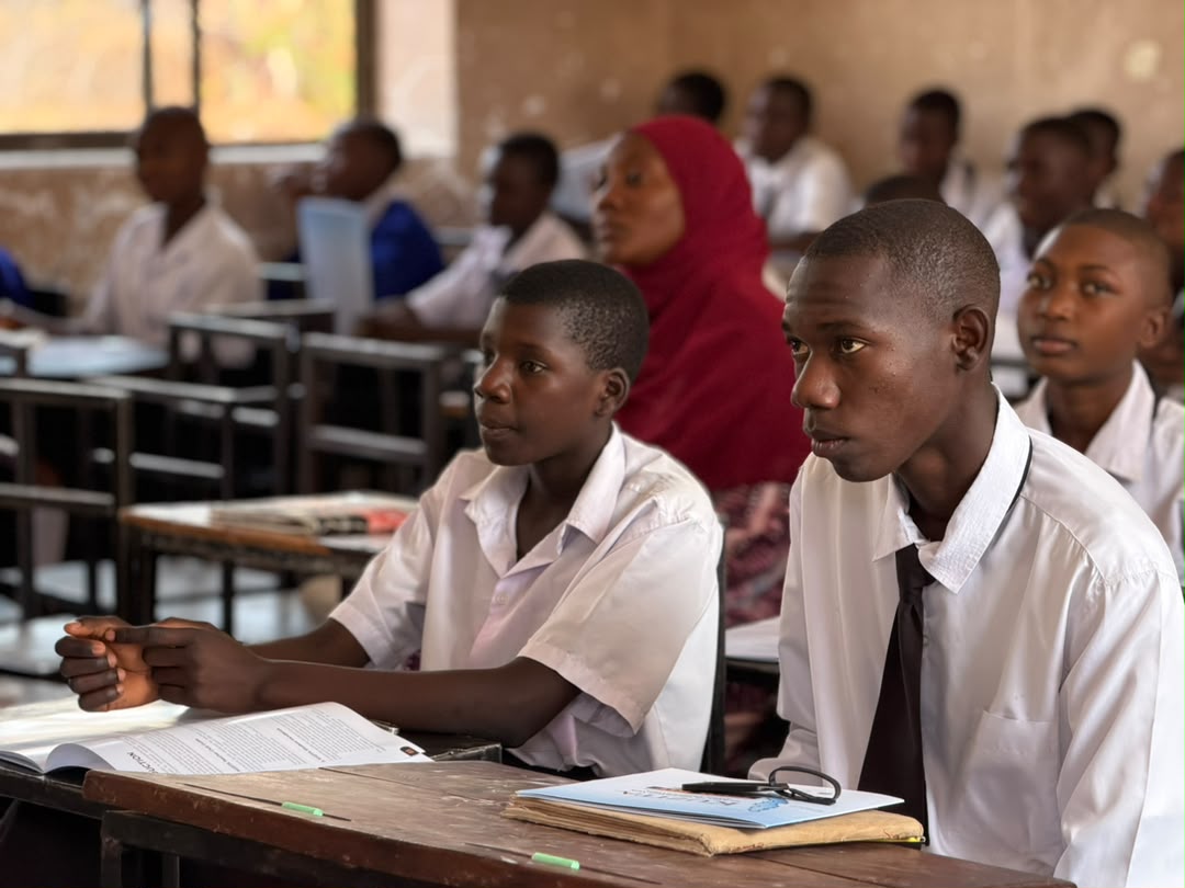 Students following a club lesson in class.